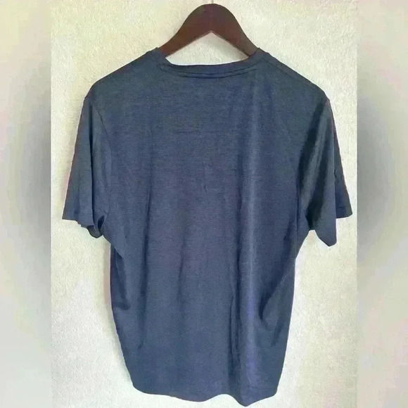 Perry Ellis Men’s Performance Blue V-Neck Tee Shirt
Size: Large - Picture 2 of 3